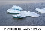 Stranegly shaped floating iceberg in Jokulsarlon lagoon, Iceland,