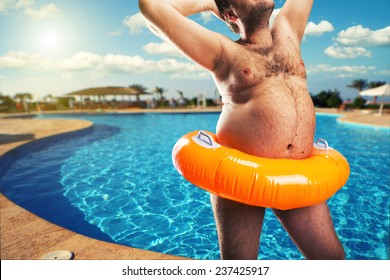 Strange naked man at the pool