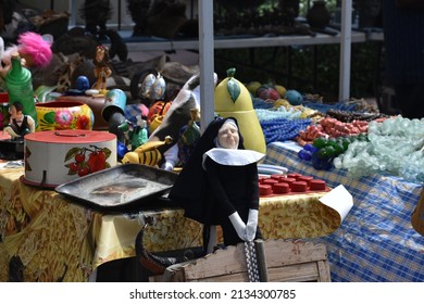 Strange Nun Doll And Other Rare Vintage Decoration Antique Items In Cheap Street Flea Market Sale Display 