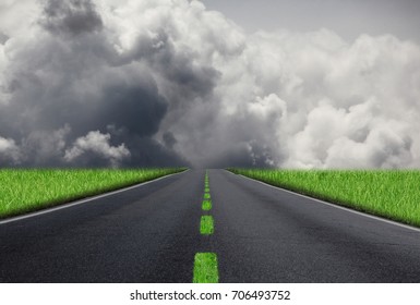 a strange road with grass