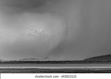 A Strange Situation Where The Rain And Sunny Sky Exist Side By Side.