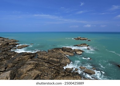 The strangeness of the rocky beach at Thong Nod Beach in Khanom District, Nakhon Si Thammarat Province, Thailand - Powered by Shutterstock