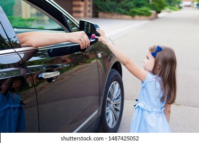 Stranger In The Car Offers Candy To The Child. Kids In Danger. Children Safety Protection Kidnapping Concept. 