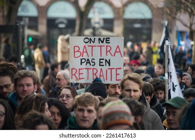 Strasbourg - France - 11 February 2023 - people protesting with placard in french : on na battra pas en retraite, in english : we won't retreat - Shutterstock ID 2261417613