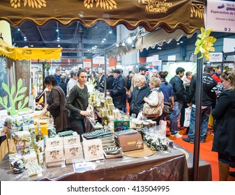 STRASBOURG, FRANCE - APR 24, 2016: People Buying Traditional Food From MArseille At The Traditional French Cusine Covered Market