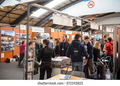 STRASBOURG, FRANCE - FEB 4, 2016: Children And Teens Of All Ages Attending Annual Education Fair To Choose Career Path And Receive Vocational Counseling - Busy College Stand