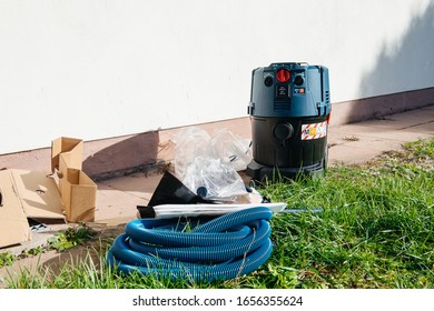 Strasbourg, France - Feb 9, 2020: Overhead View Of New Unboxed In The Grass Yard Bosch GAS 35 M AFC Professional Wet And Dry Vacuum Cleaner With 35 L Automatic Filter Cleaning Dust Class M