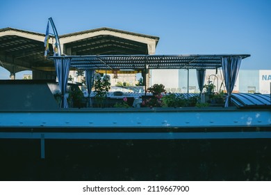 Strasbourg, France - Jul 29, 2018: Rooftop Of A Peniche Home Boat In Strasbourg - Flowers On The Terrace