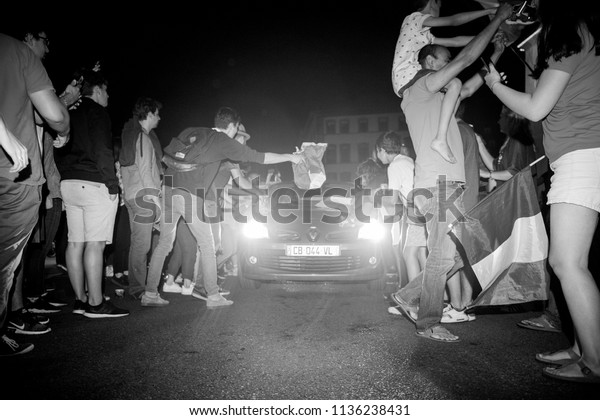 STRASBOURG, FRANCE - JULY\
10, 2018: Rodeo with cars - unique French celebration after the\
victory of France qualify for the final of the 2018 FIFA World Cup\
after their victory