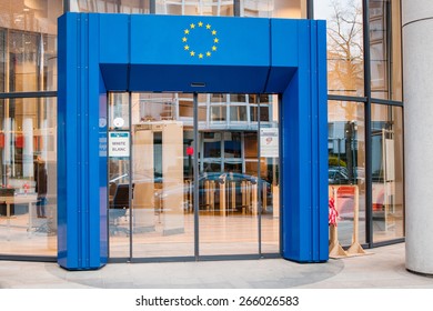 STRASBOURG, FRANCE - MARCH 24, 2015: Entrance To Council Of Europe European Union With Blue Gate And European Union Stars Logo Above And White Security Code Badge On The Door.