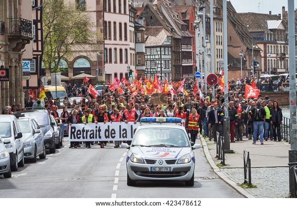 STRASBOURG, FRANCE - MAY 19, 2016:\
Retire labor reform placard during a demonstrations against\
proposed French government\'s labor and employment law\
reform
