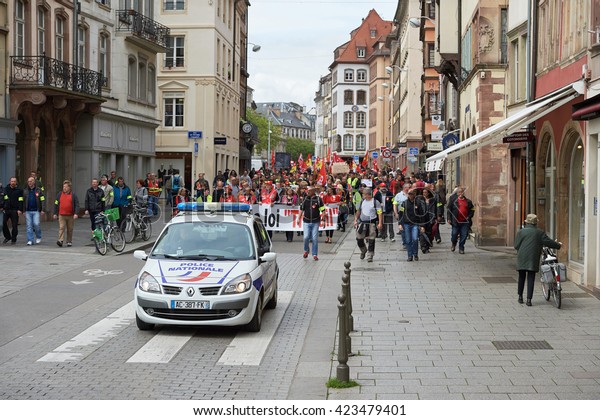 STRASBOURG, FRANCE - MAY 19, 2016:\
Retire labor reform placard during a demonstrations against\
proposed French government\'s labor and employment law\
reform