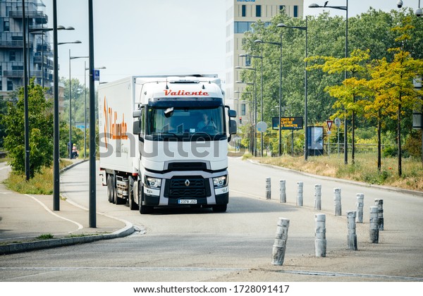Strasbourg, France - May 9, 2020:\
Front view of Renault truck driving fast on an empty highway at the\
border between France and Germany during COVID-19\
pandemics
