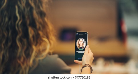 STRASBOURG, FRANCE - NOV 3, 2017: Woman Trying Face ID - Latest Apple IPhone X Goes On Sale In Apple Store Worldwide