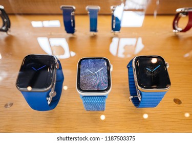 STRASBOURG, FRANCE - SEP 21, 2018: Apple Store the new three latest Apple Watch Series 4 wearable personal luxury watch with leather and sport loop