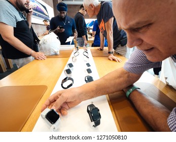 STRASBOURG, FRANCE - SEP 21, 2018: Senior Man Looking At The New Apple Watch Series 4 Smartwatch In Apple Store