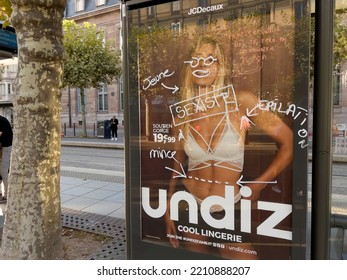 Strasbourg, France - Sept 2022: Undiz Advertising In Tramway Station On JCDecaux OOH With Drawn By Activists Messages As The Brand Is Sexist