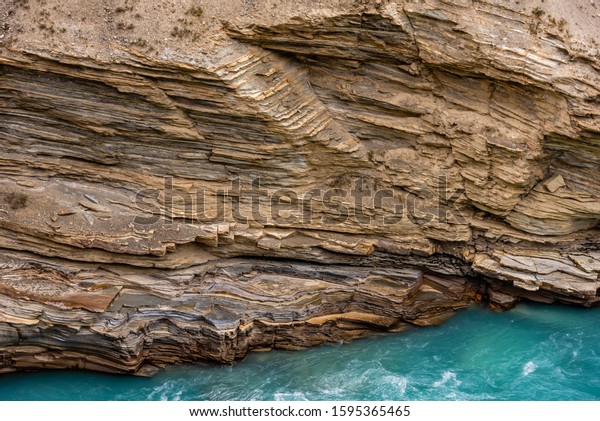 Strata of Mudrocks, it is a silicicastic\
sedimentary rock include siltstone, claystone, mudstone, slate and\
shale formed by accumulated sedimentation then uplifted in folded\
mountains of Himalayas.