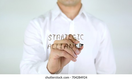 Strategic Alliance, Man Writing On Glass