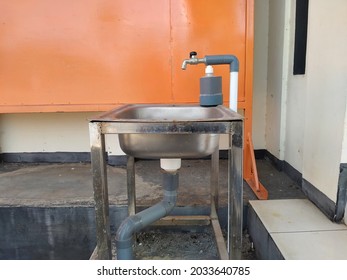 At Strategic Locations Throughout The Communities, Handwashing Stations Were Set Up With A Bleach Solution.