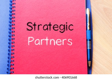 Strategic partners text concept write on notebook