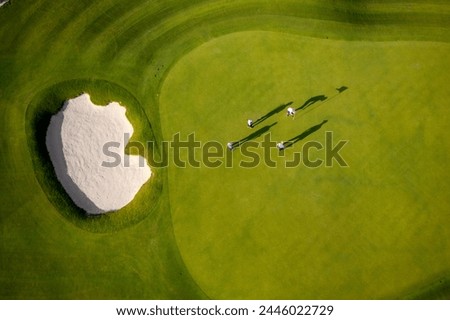 Strategically placed bunkers dot the landscape, adding both beauty and challenge to the course, where precise shots are rewarded and wayward shots.