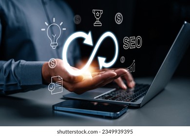 strategy, goal, success, target, aim, futuristic, marketing, performance, achievement, choose. typing at keyboard and then hand of palm holds the trophy, strategy, light bulb, target symbolic showing.