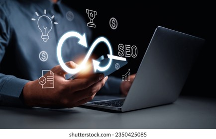 strategy, goal, success, target, aim, futuristic, marketing, performance, achievement, choose. touching smartphone and then hand of palm holds the trophy, strategy, light bulb, target symbolic showing