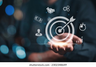 strategy, goal, success, target, social network, aim, futuristic, marketing, performance, achievement. at hand palm has bullseye. around that's social network target and strategy goal. aim and select.