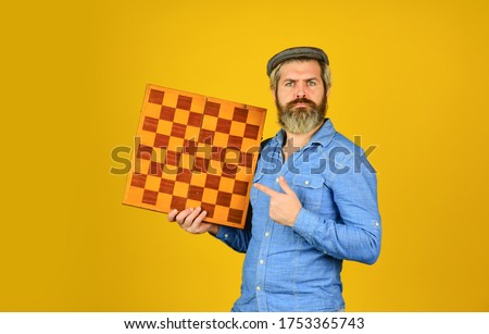 strategy ideas concept. bearded man hold chess board. intelligence quotient. human brain working. brainstorming concept. play chess tournament. Intelligence level measurement. level up your iq.