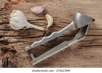 Straw Chopper Garlic On Old Wooden Boards