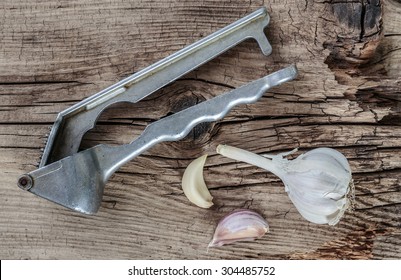 Straw Chopper Garlic On Old Wooden Boards