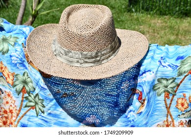 Straw Hat And Hawaiian Shirt