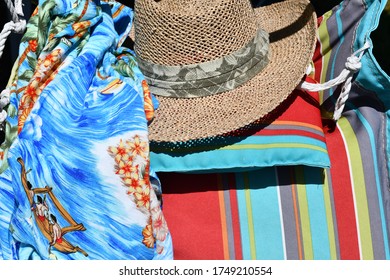 Straw Hat And Hawaiian Shirt On A Hammock