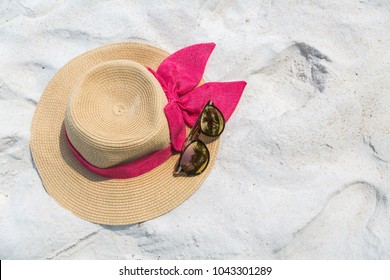 sun hat with pink ribbon