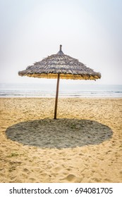 Straw Umbrella In Beach