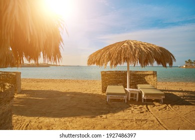 A Straw Umbrella On A Beautiful Beach