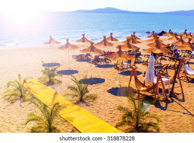 Straw Umbrellas On Beautiful Sunny Beach In Bulgaria Resort