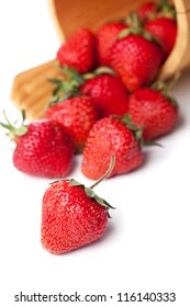 Strawberries In Basket Hanging On A White Background