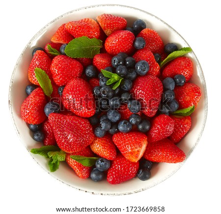 Similar – Bowl with red berries and mint leaves