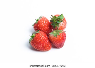 Strawberries close up on white background - Shutterstock ID 385877293