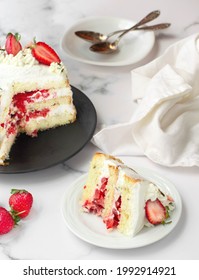 Strawberries And Heavy Cream Layered Cake. White Background