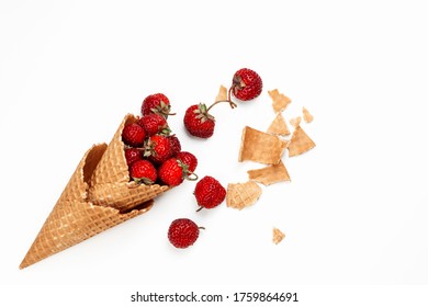 Strawberries In Ice Cream Waffle Cone With Wafer Pieces On White Isolate Background. Summer Flat Lay Testily Concept.