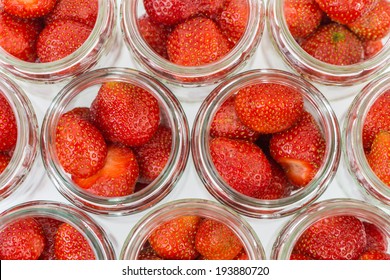 Strawberries in jars. Top view.