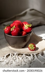 Strawberries In Natural Light Showcasing Their Beautiful Color And Texture For Food And Organic Produce Growers. Rustic And Country Vibes Highlighting The Bounty Of Summer Strawberries.