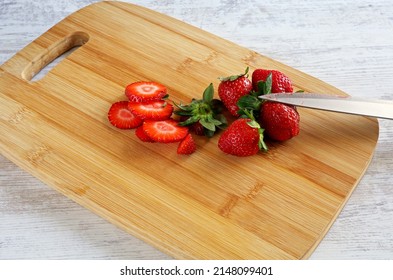 Strawberries On Wooden Chopper Board