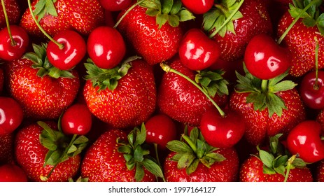 strawberries and sweet cherries close up
red berry background. - Powered by Shutterstock