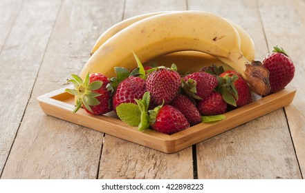 Strawberry Banana Fruits On Wood Table