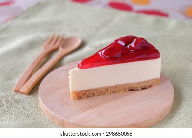 Strawberry Cheese Cake On Wood Plate