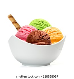 Strawberry, chocolate and mint ice cream scoops with wafer stick in bowl isolated on white background